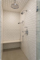 Master Bathroom Subway Tile Shower Walls and Hexagon Floor